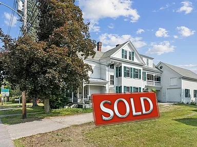 Sold Sign in front of church parsonage